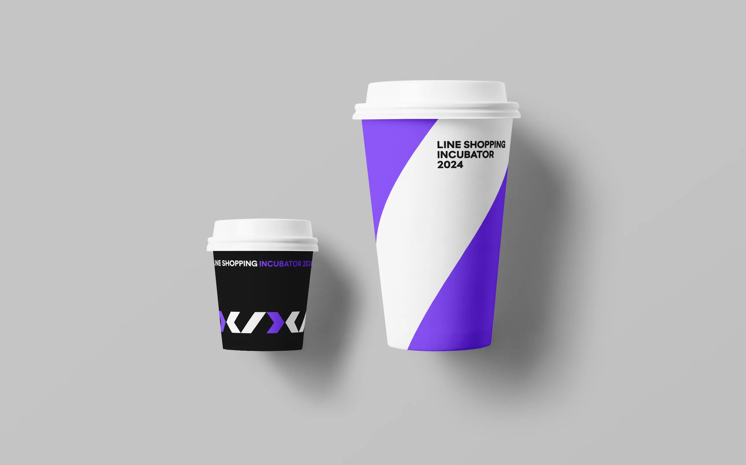 LINE Shopping Incubator 2024 identity applied to branded cups.