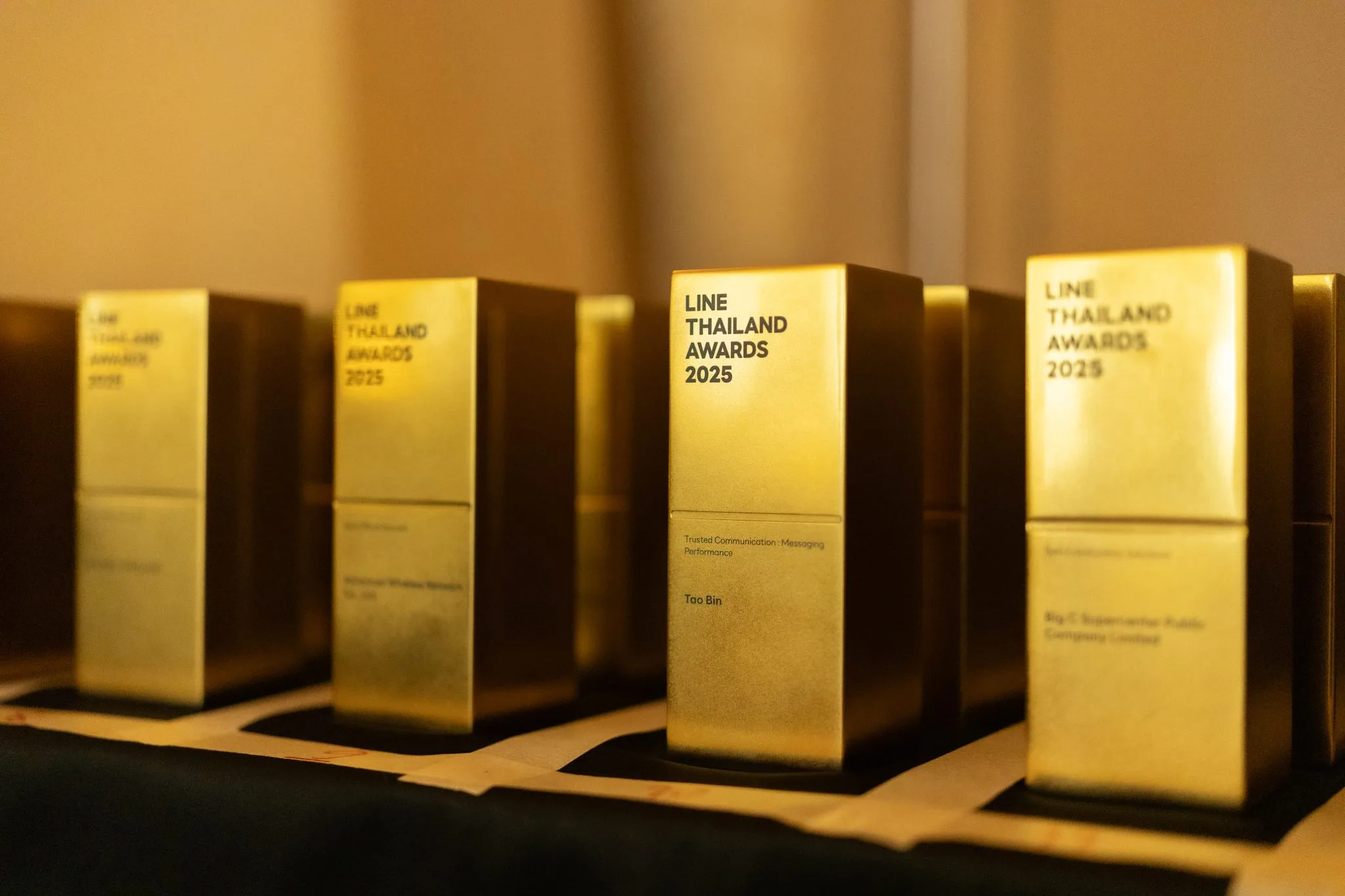 Gold award trophies arranged for presentation.