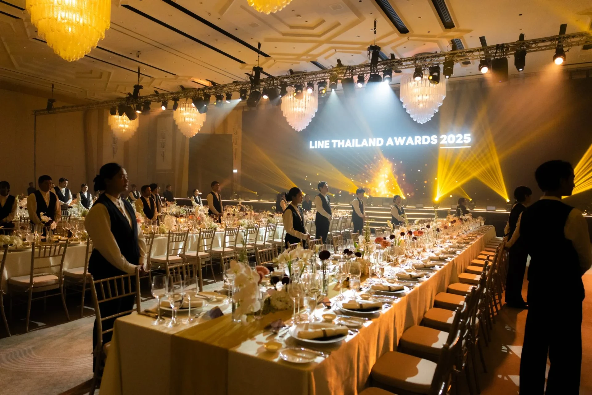 Dining area facing the illuminated awards stage.