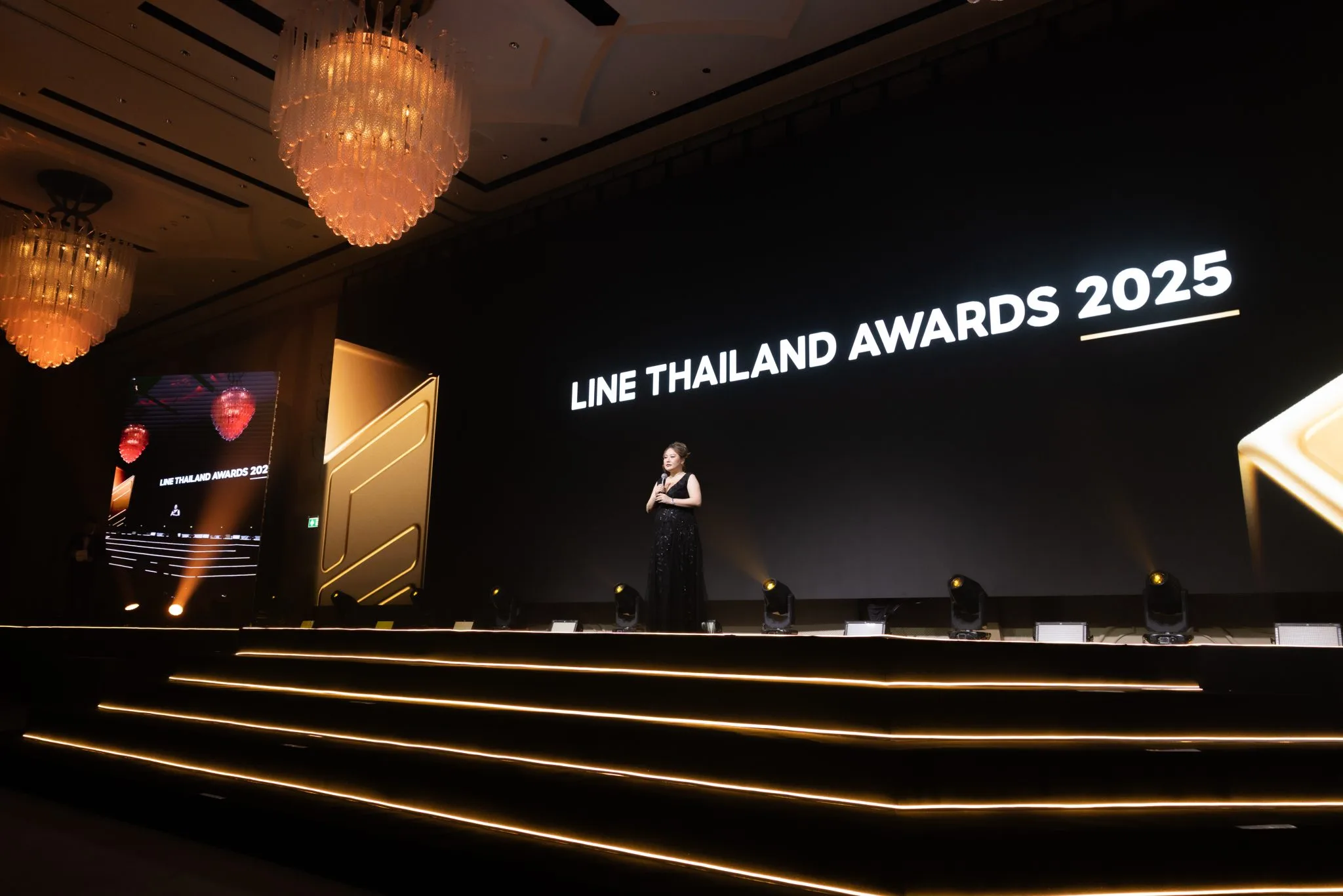 Presenter on the LINE Thailand Awards 2025 stage.